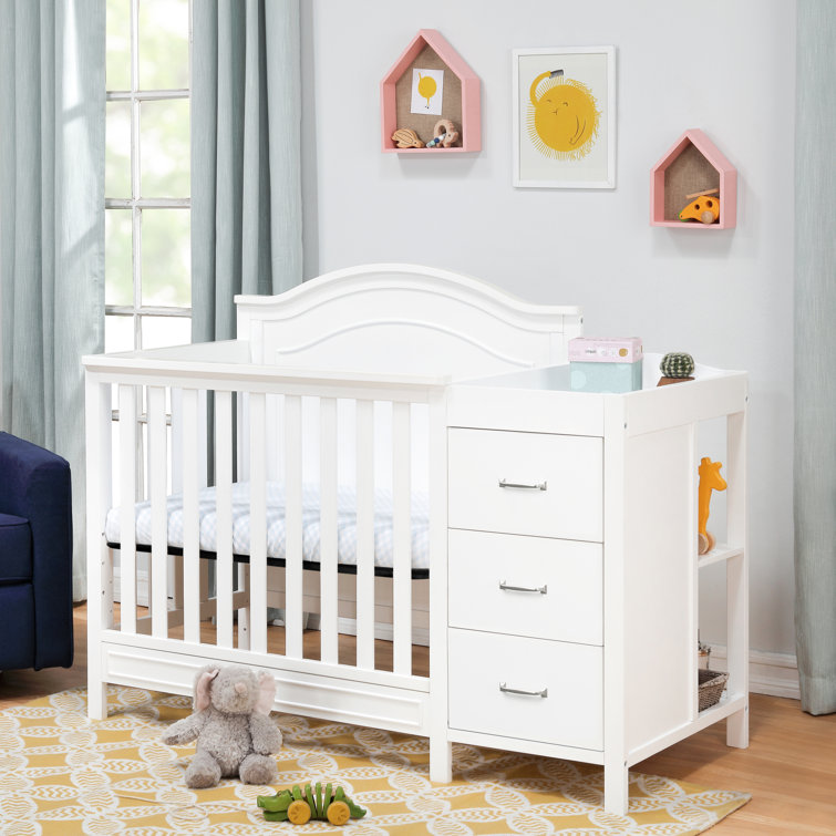 Mini crib 2025 with changing table